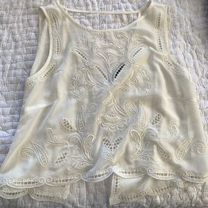 Elegant patterned cream top